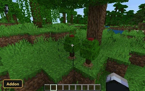 two small red-fruited trees in a jungle biome