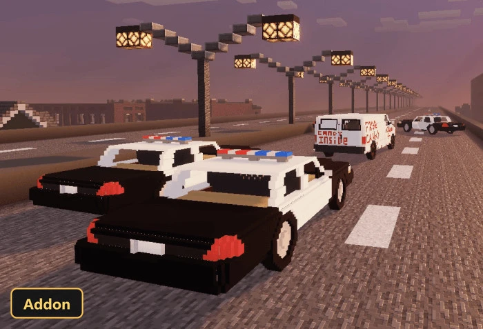 police cars and a white van on a city road